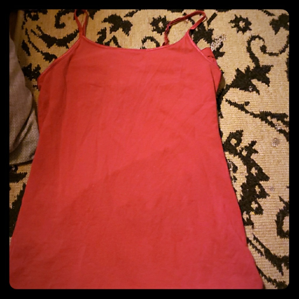 A red tank top with bra inside.